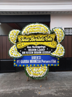 Papan Bunga Duka di Toba